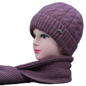Women's purple knitted hat and scarf set with thick cable pattern for winter warmth