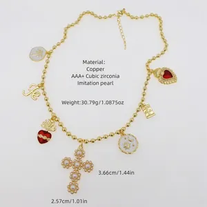 18k gold plated copper necklace with zircon cross and heart charms on a white surface