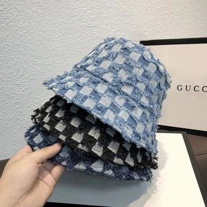 Three-piece denim checkerboard bucket hat set with distressed fringe edges and street style