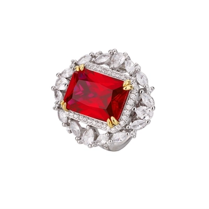 Elegant floral silver ring featuring square red ruby and marquise-cut zircon accents