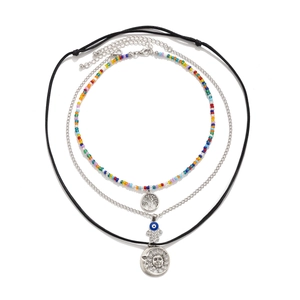 Detailed set of 3 ethnic necklaces featuring Tree of Life, Hamsa Hand, and Sun Moon charms