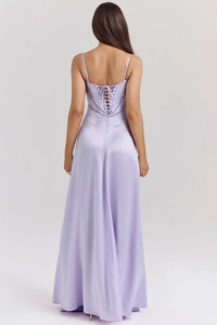 Detail of the back cross-tie lacing and lavender satin texture on the evening dress