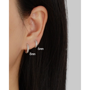 Detailed comparison of 6mm and 8mm S925 sterling silver diamond huggie earrings on ear