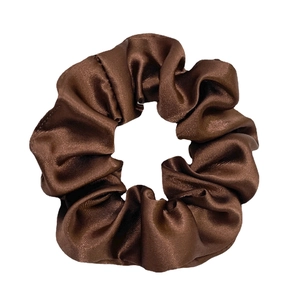 Premium dark brown satin scrunchie with soft pleated texture and elegant silk shine