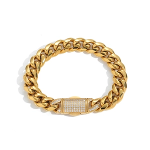 Detailed close-up of 18K gold-plated Cuban link bracelet with cubic zirconia spring clasp
