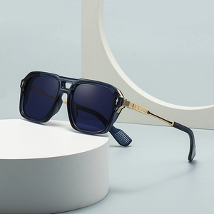 Retro square aviator sunglasses with dark blue frame and gold metal temples on a white stand