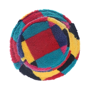 Colorful patchwork faux shearling bucket hat with vibrant checked pattern for winter warmth