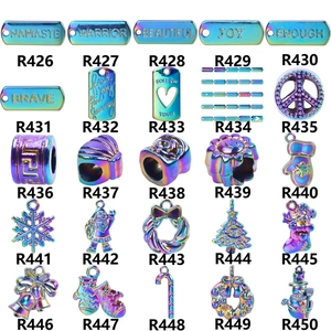 Detailed grid of crystal wing pendants and silver-plated alloy charms for DIY jewelry