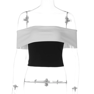 Detail of trendy contrast off-shoulder crop top in black and white on mannequin