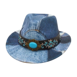 Detailed view of denim sun hat featuring turquoise gemstone and vintage floral embroidery