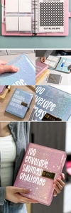 Close-up of glitter binder with combination lock and 100 envelope savings tracker cards