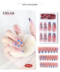 Detailed view of long ballerina press-on nails with blue French tips and heart patterns
