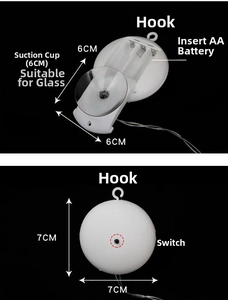 Detailed view of LED light battery box with suction cup and hanging hook features