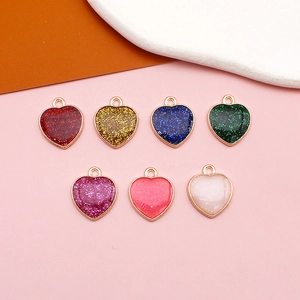 Colorful pearlescent glitter heart pendants in seven colors for DIY jewelry making