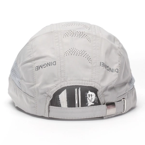 Detail of light grey quick-dry baseball cap featuring laser-cut vents and adjustable buckle