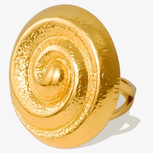 Macro detail of gold 18k plated swirl texture design on a 304 stainless steel ring