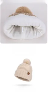 Detail of winter knitted hat with thick white fleece lining and sparkling sequin accents