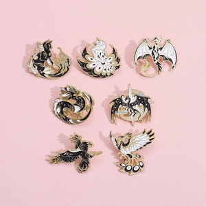 Set of 7 monochrome enamel pins featuring dragon and phoenix in black, white and gold