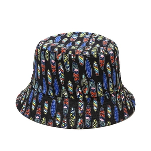 Black cotton bucket hat with colorful surfboard patterns and Ocean Calling prints