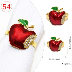 Red apple Christmas napkin ring with green leaves and crystals for holiday table decor