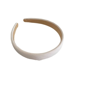 Elegant white textured chiffon headband with French bow style and chic striped pattern