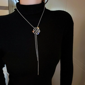 Retro dark style silver necklace featuring a camellia pendant with zircon and long tassel