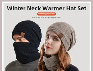 Winter knitted hat and neck warmer set with leather mountain logo patch detail