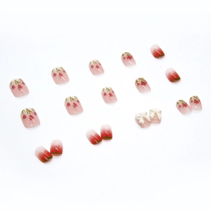 Short square press-on nails with pink tulips, green gradient, and 3D white bow designs