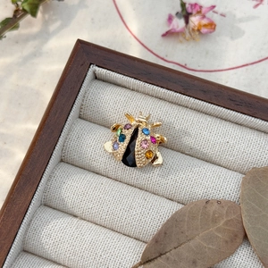 Exquisite gold beetle brooch with colorful rhinestones set in a wooden jewelry gift box