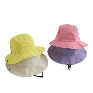 Outdoor quick-dry bucket hats for kids in four colors with wide brim and chin strap