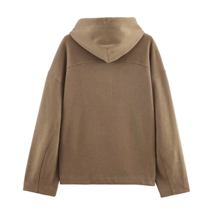 Back view of brown ribbed hoodie showing fine corduroy texture and soft casual style