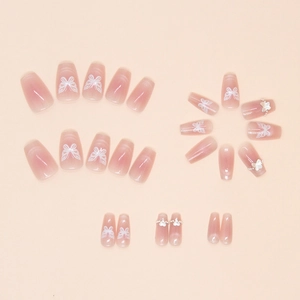Pink blush cat-eye press-on nails set with 3D butterfly and pearl accents