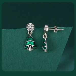 Detailed close-up of S925 sterling silver Christmas tree studs with green enamel and zircons