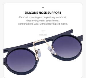Detail of adjustable silicone nose pads and golden metal bridge on round sunglasses