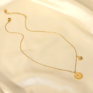 Elegant 18K gold plated stainless steel necklace with starburst and zircon round pendant