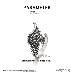 Detailed view of vintage stainless steel angel wing ring with 17mm width specifications