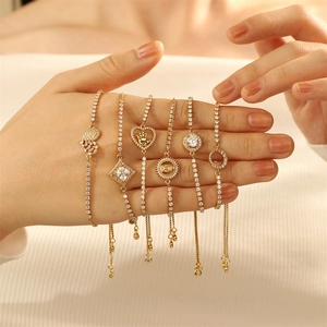 6-piece gold adjustable tennis bracelet set with sparkling cubic zirconia and heart charms