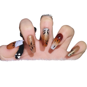 Handmade brown gradient coffin press-on nails with maple leaf art and golden glitter