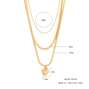 Detailed view of layered gold stainless steel necklace with size measurements in cm