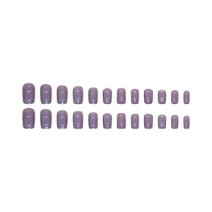 24 pieces of solid lavender short squoval press-on nails neatly arranged on white background