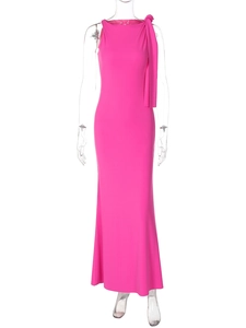 Close-up of rose pink slim fit dress with shoulder bow detail and elegant pleats