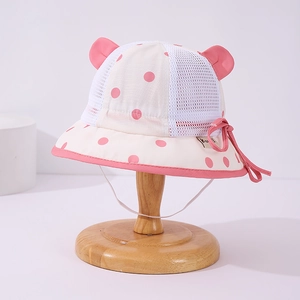 Detail of baby sun hat with pink polka dots, mesh backing, and cute animal ears