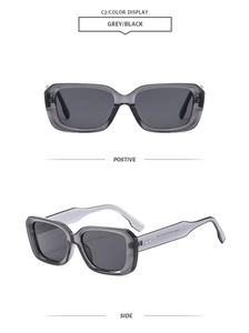 Detailed close-up of retro square sunglasses featuring silver double diamond rivets on grey frames