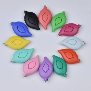 Leaf-shaped personal safety alarms in 12 vibrant colors displayed in a circular pattern