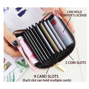 Pink large capacity zipper card holder with 9 slots and 2 coin pockets in hand