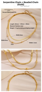 Detail view of gold PVD plated stainless steel double layer snake chain and bead necklace