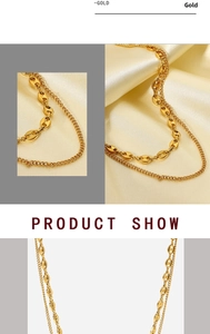 Detail view of 18K gold plated double layer necklace with pig nose link design