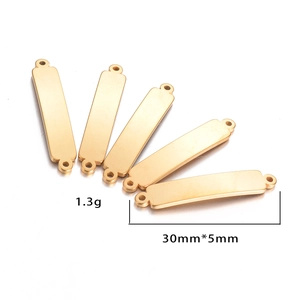 Detailed view of five golden curved bar connectors with dimensions 5x30mm for DIY jewelry