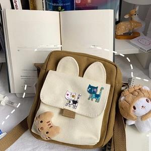 Japanese style canvas crossbody bag with cat ear design and colorful kitten brooch