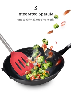 Silicone spatula stir-frying broccoli and shrimp in a non-stick pan with macro details